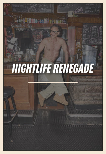 Man standing in a bar with text overlay that says 'NIGHTLIFE RENEGADE'.